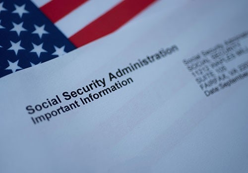 A social security award letter on top of an American flag.
