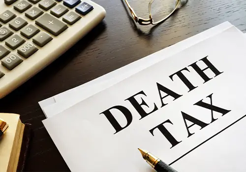 Death Tax Documents And Pen On A Table
