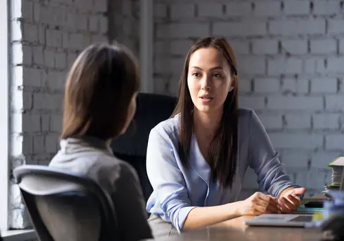 Female Attorney Having A Conversation With Her Client
