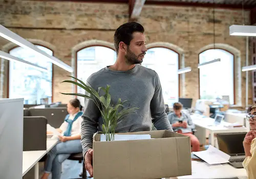 Man Holding Box Of Personal Items Quit His Job