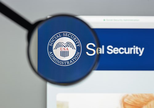A magnifying glass enlarging the Social Security Administration logo.